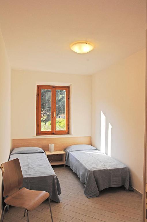 Appartamenti Casa Pineta Marina di Campo Rum bild