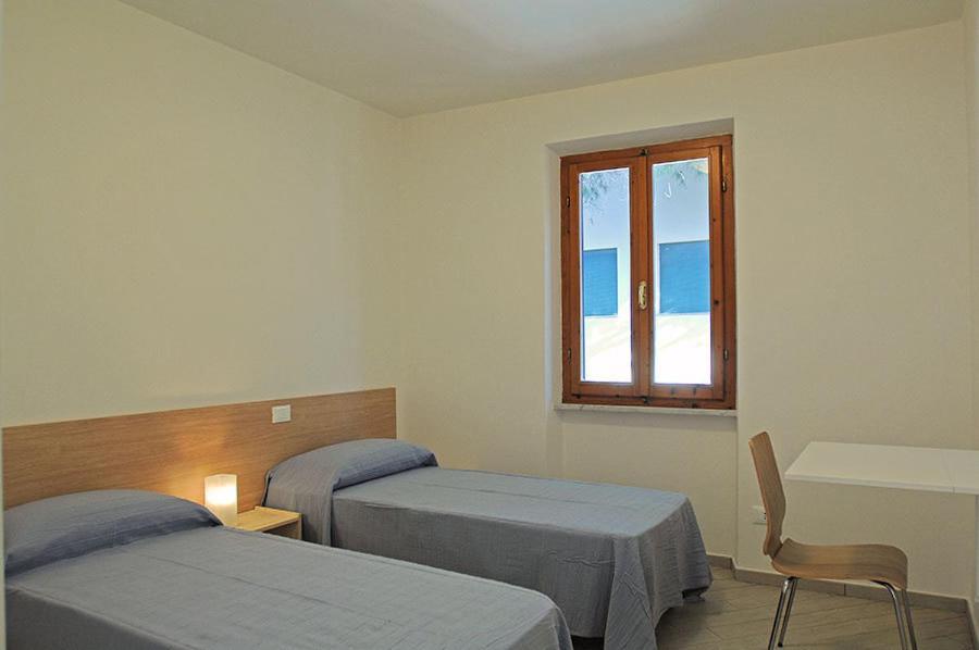 Appartamenti Casa Pineta Marina di Campo Rum bild