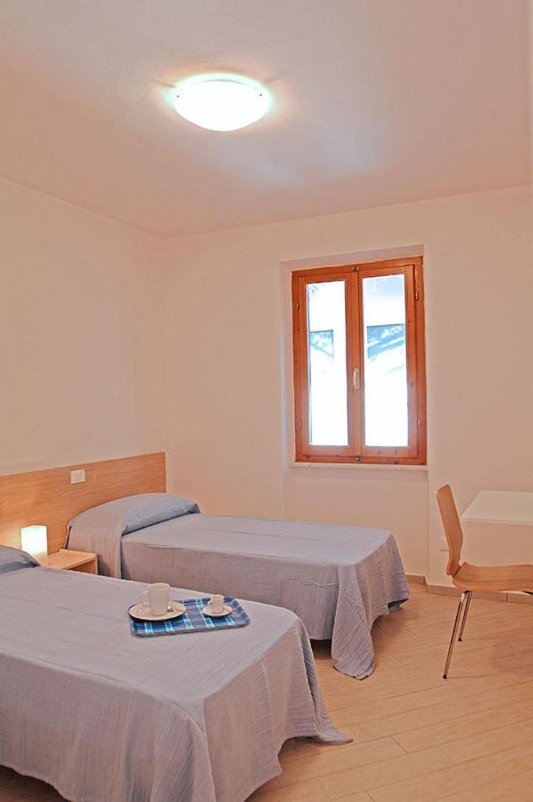 Appartamenti Casa Pineta Marina di Campo Rum bild